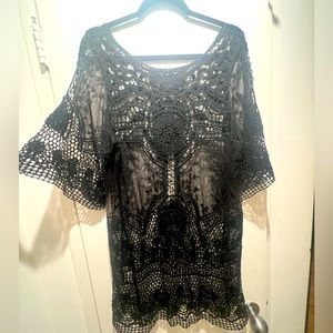 Guipure, lace and embroidered chiffon dress in black.